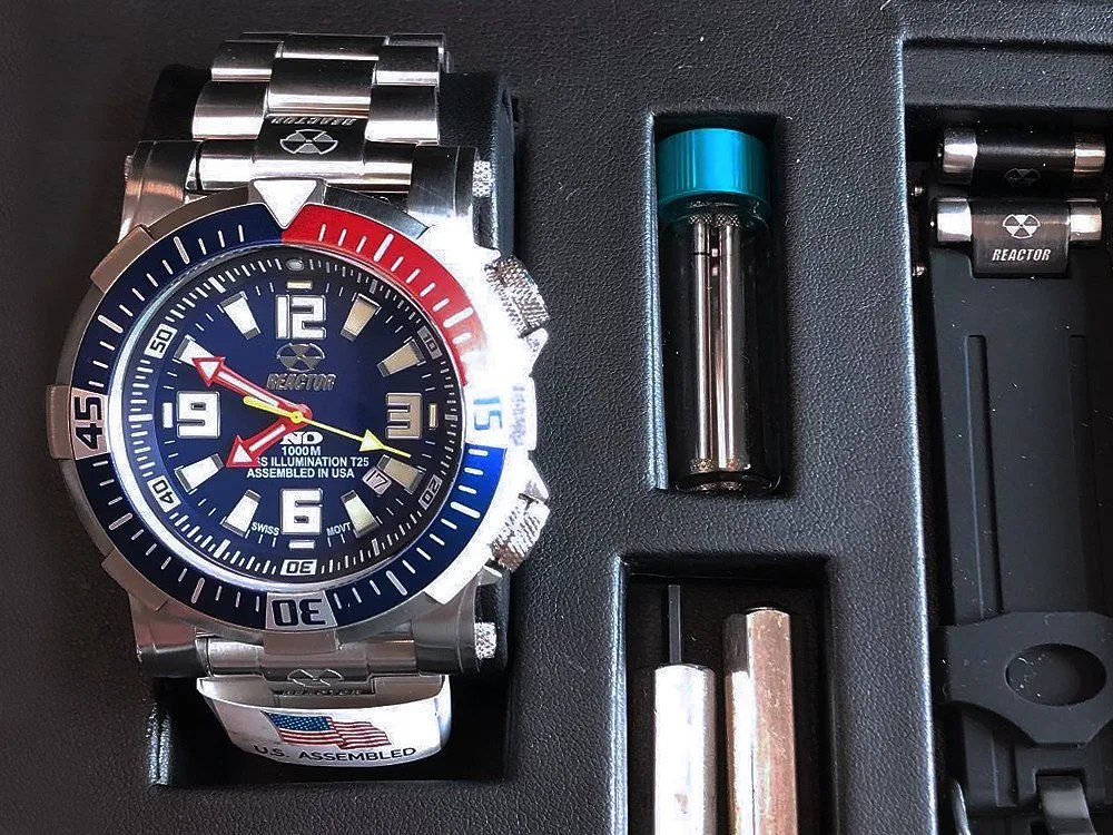 Reactor sport watch with link tools for sizing and battery service
